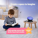 Sensory Sea Lamp by Bright Autism – child reading on floor near glowing lamp, soft wave light