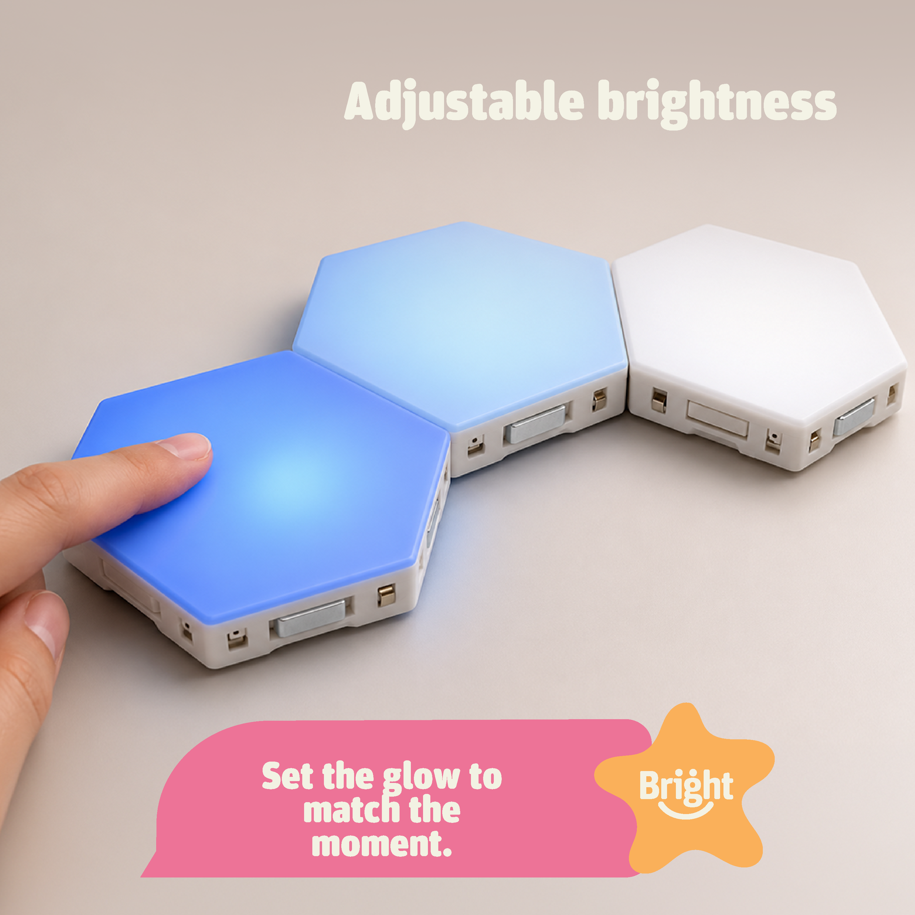TAP-TAP Sensory Lights by Bright Autism – hand adjusting brightness on connected hexagon tiles